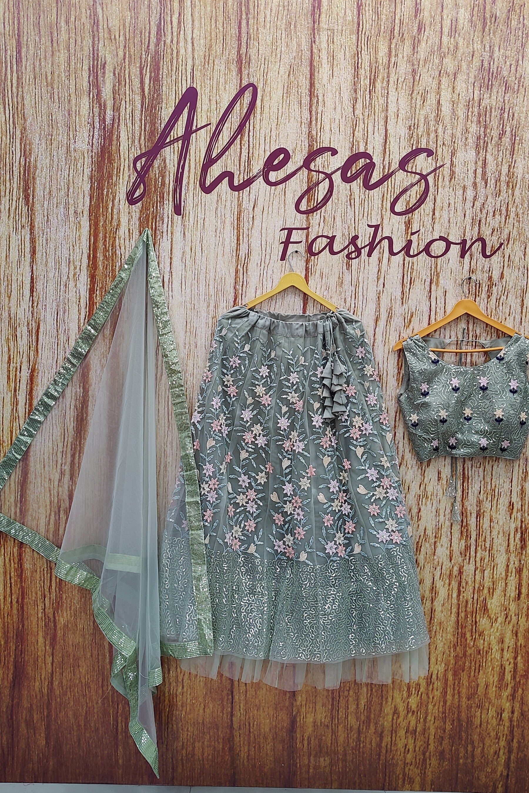 Pista Color Designer Sequins Embroidery Work Net Lehenga Choli