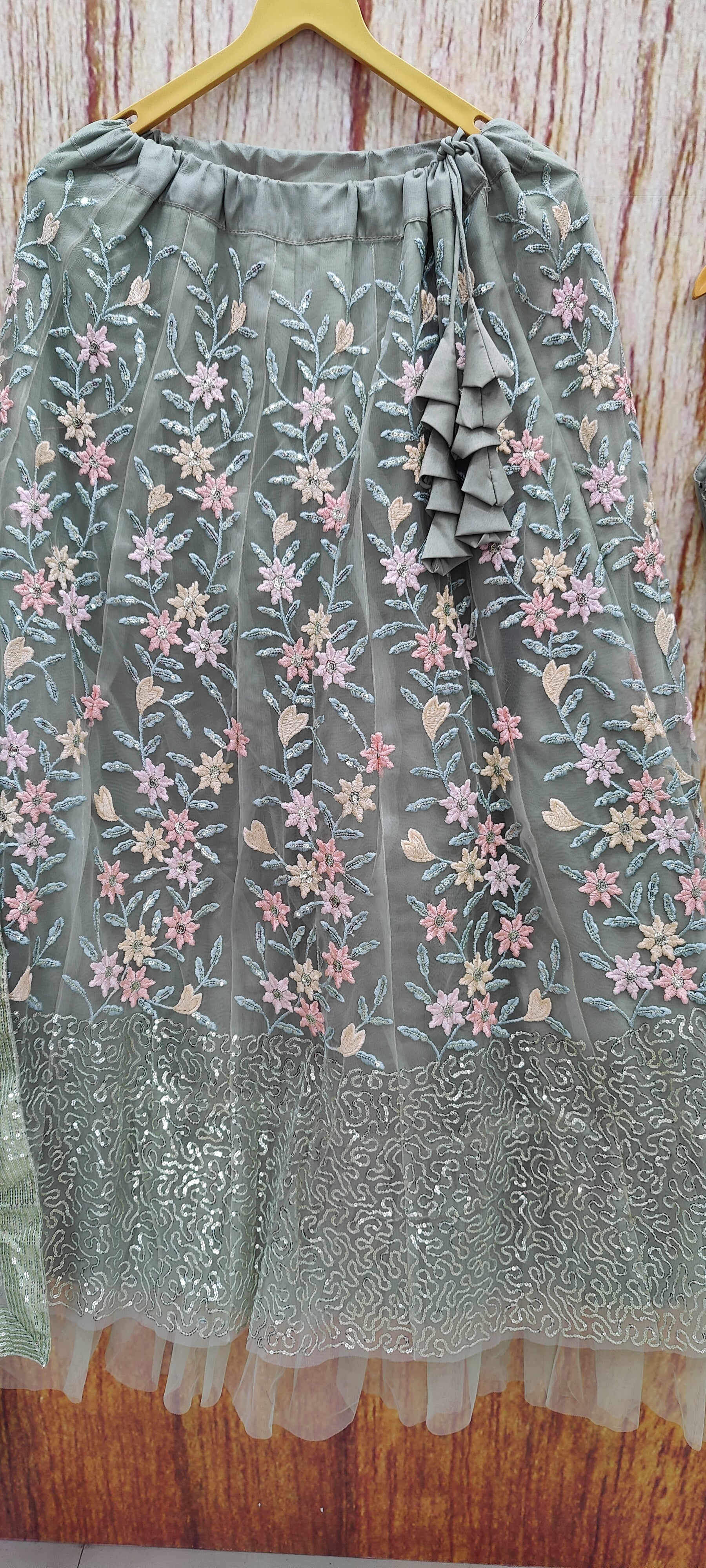 Pista Color Designer Sequins Embroidery Work Net Lehenga Choli