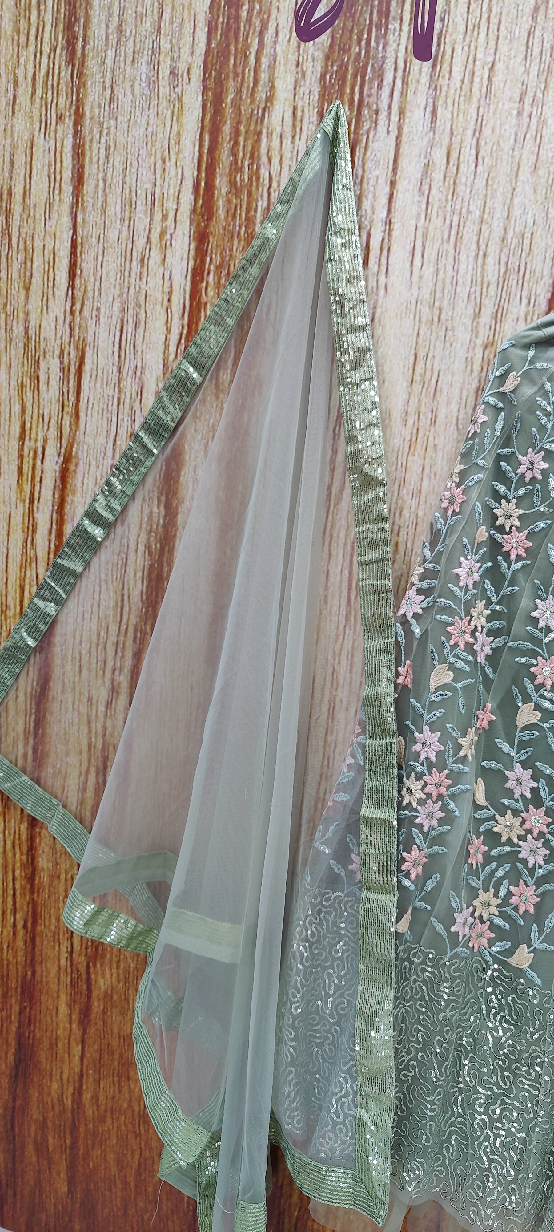 Pista Color Designer Sequins Embroidery Work Net Lehenga Choli