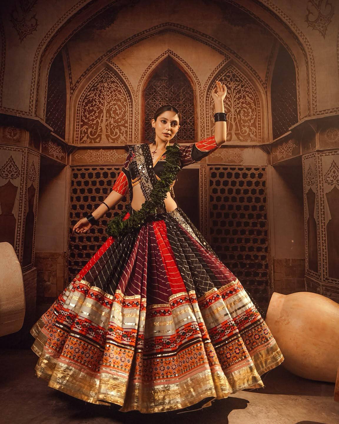 Black-Red Mirror Work Muslin Navratri Lehenga Choli.