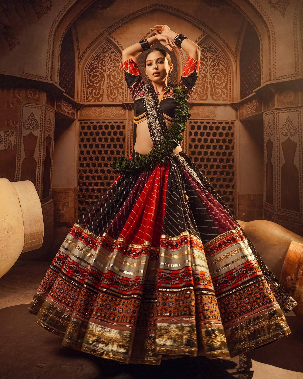 Black-Red Mirror Work Muslin Navratri Lehenga Choli.