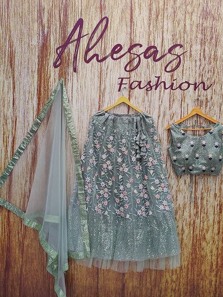 Pista Color Designer Sequins Embroidery Work Net Lehenga Choli
