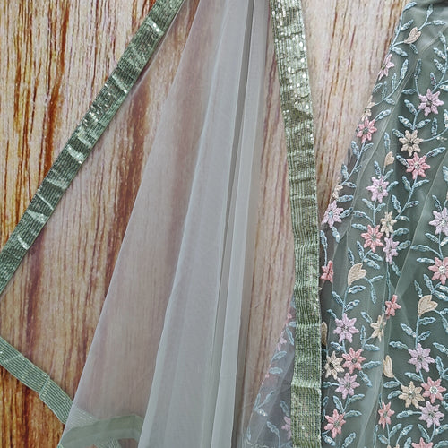 Pista Color Designer Sequins Embroidery Work Net Lehenga Choli