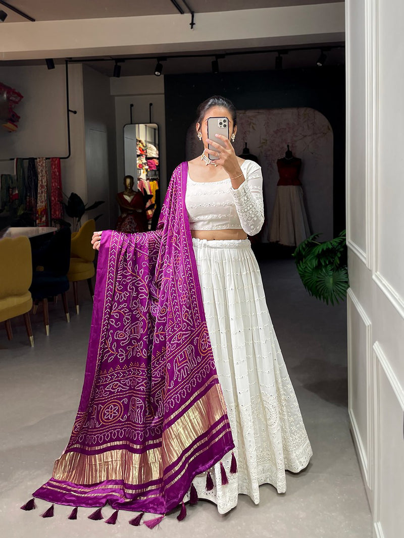 White Color Georgette Lucknowi Work Lehenga Choli With Bandhej Dupatta