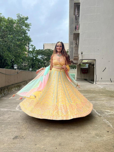 Yellow Color Wedding Wear Zari Sequins Embroidery Work Lehenga Choli