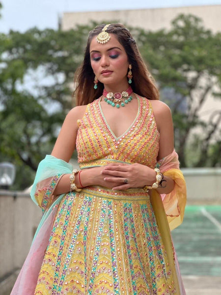 Yellow Color Wedding Wear Zari Sequins Embroidery Work Lehenga Choli