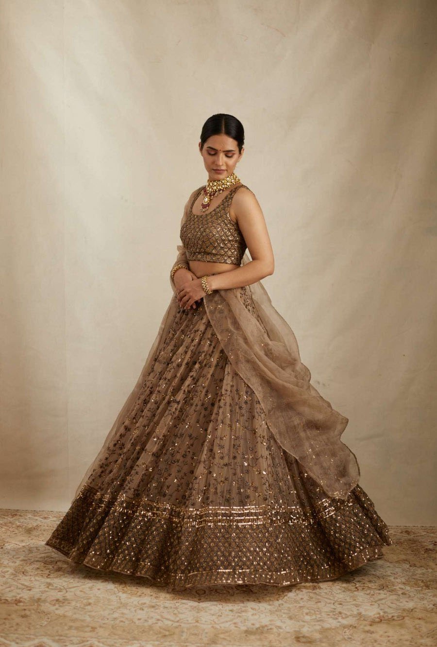 Golden Color Heavy Sequins Work Designer Net Lehenga Choli
