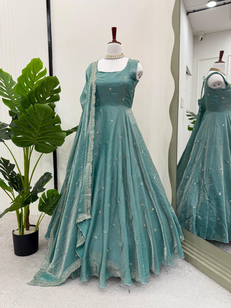 Rama Green Color Trendy Embroidered Work Silk Gown