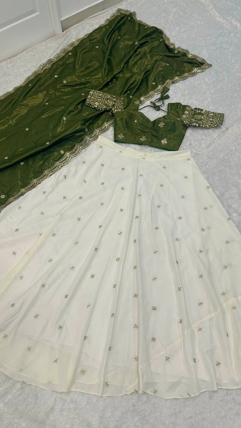 White Color Heavy Sequence And Zari Work Wedding WearLehenga Choli