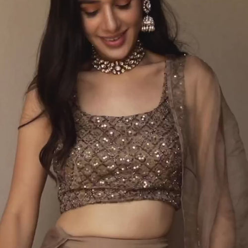 Golden Color Heavy Sequins Work Designer Net Lehenga Choli